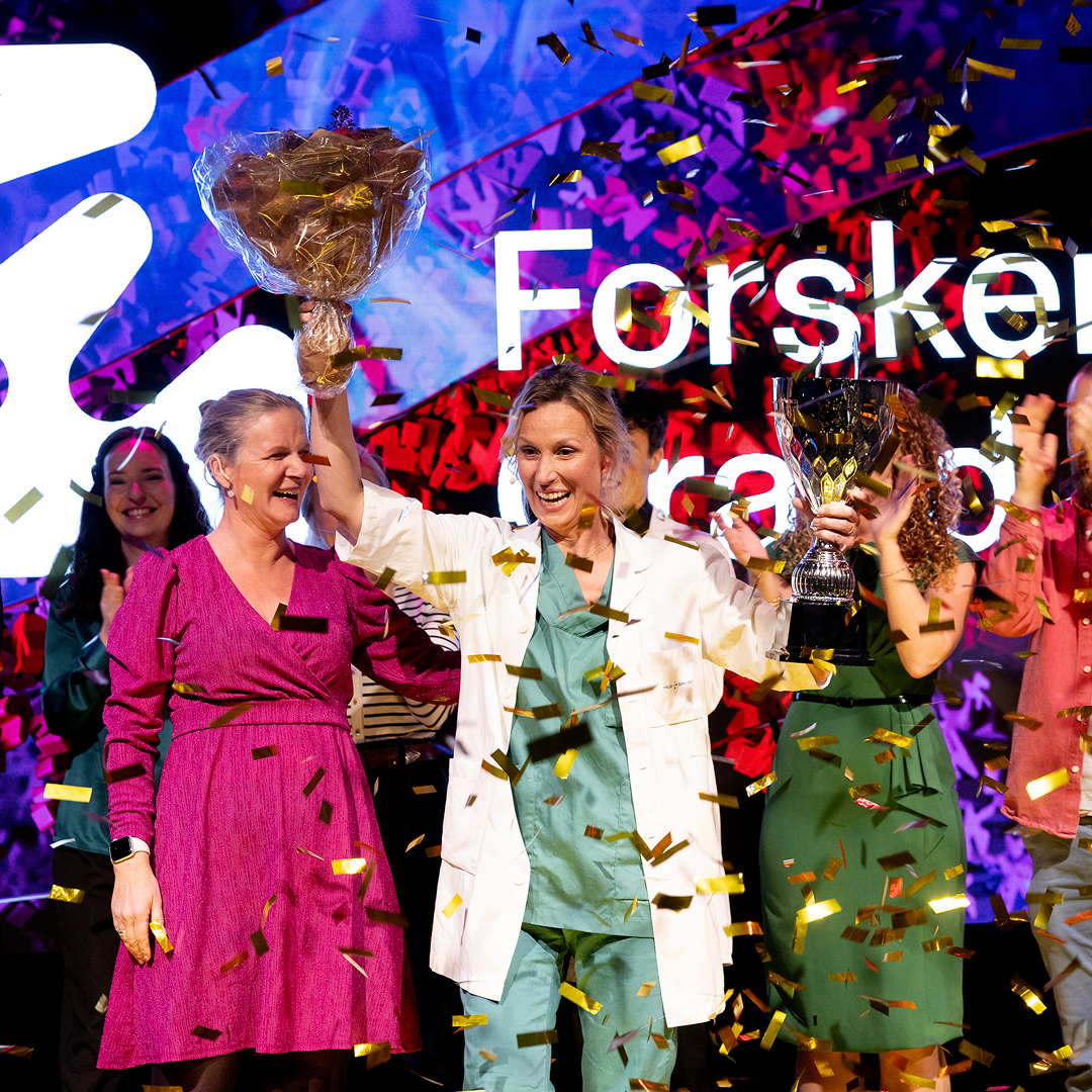 Vinnere feirer med pokal og konfetti under et event arrangert av Medvind Eventbyrå.